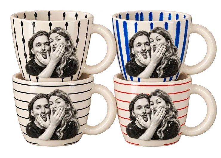 A set of four mugs in the Black & White style. Sculpted and painted in black, white and grey, like an old photo come to life.