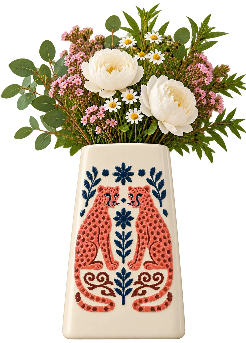 A cream vase with two coral folk-art leopards face to face around navy flowers in mosaic stones, holding peonies and daisies